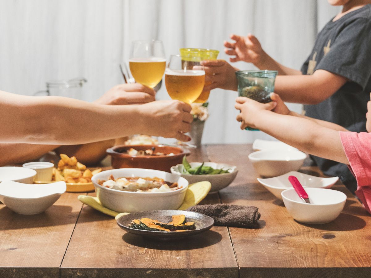 Family sharing a budget-friendly home-style dinner together