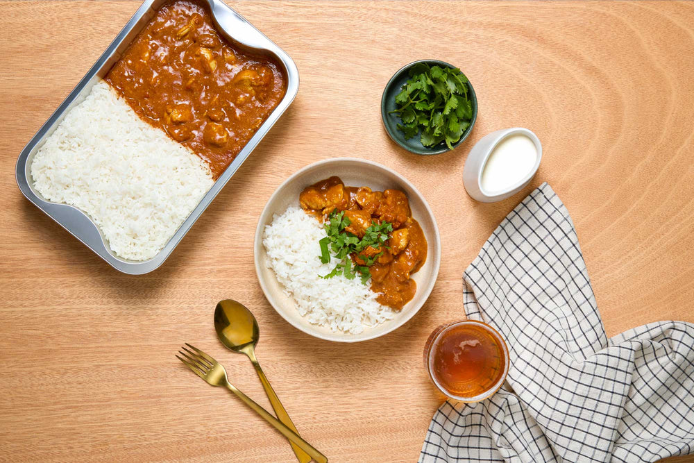 Plated chicken meal with rice and vegetables - frozen ready-made family meals by Delicious and Done NZ