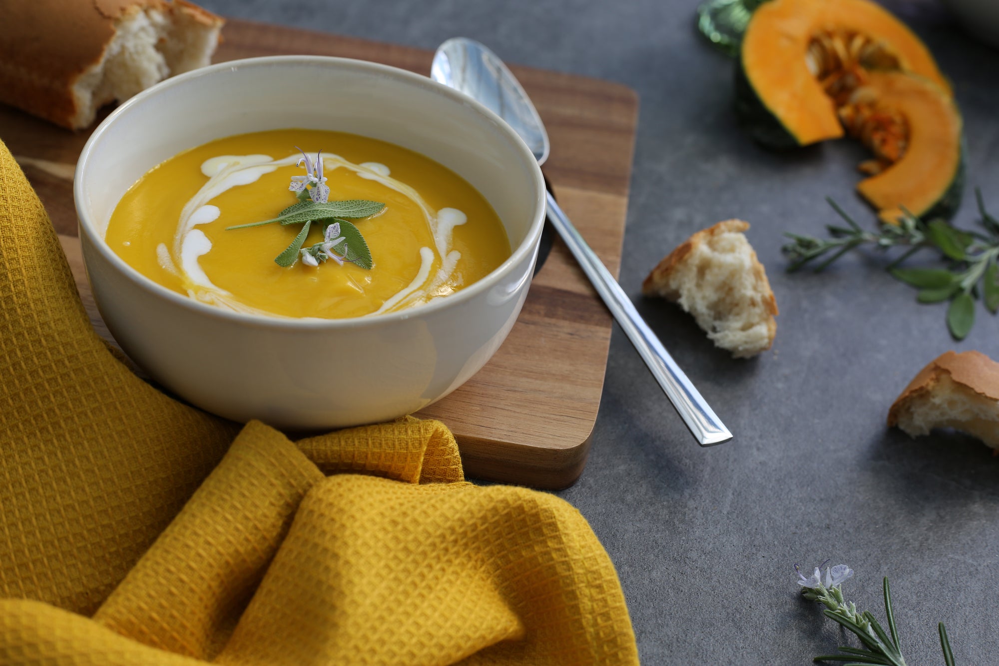 Butternut, Sage & Ginger Soup with a swirl of cream, served with crusty bread